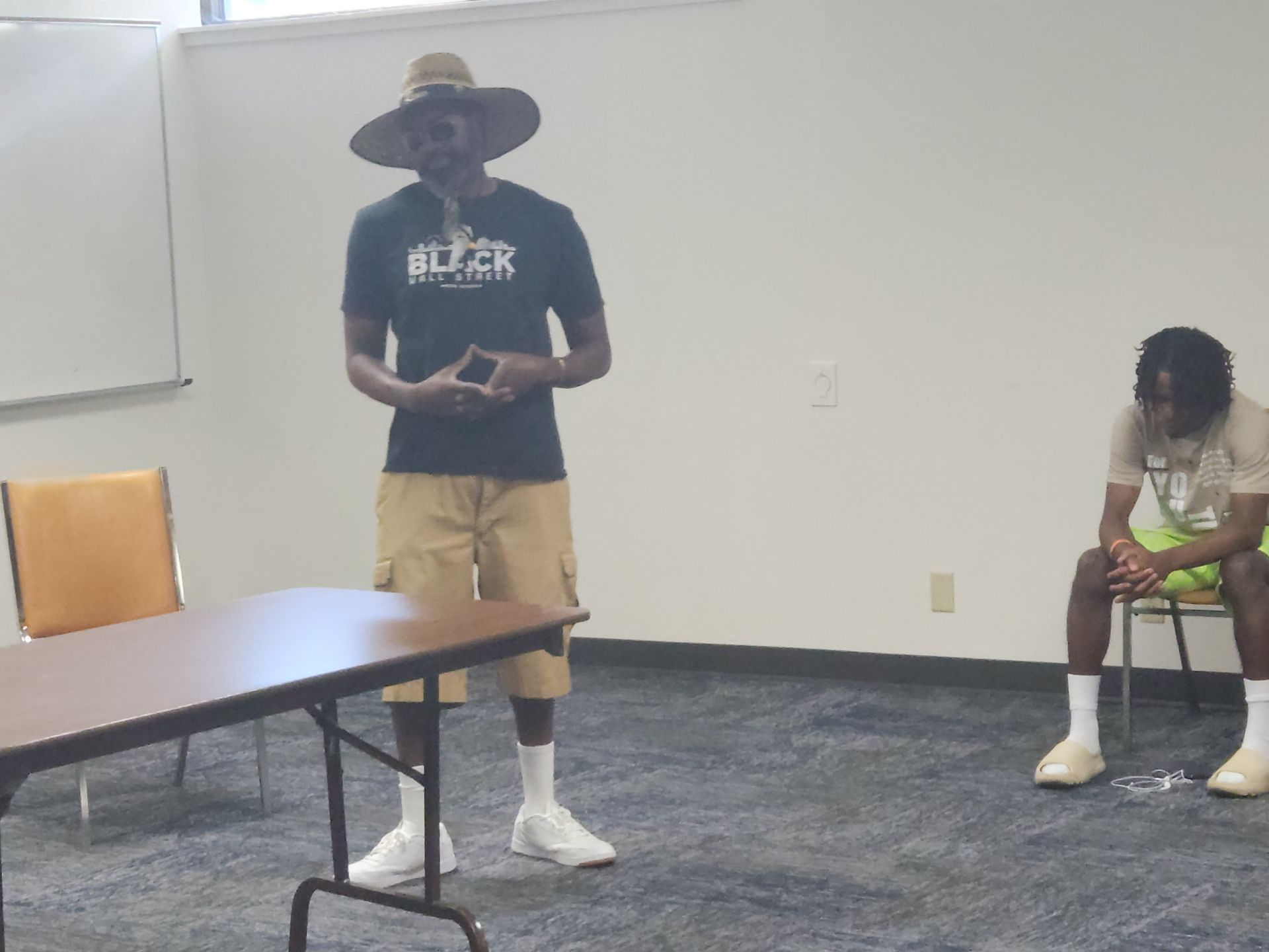 APRI Youth leader talks to members