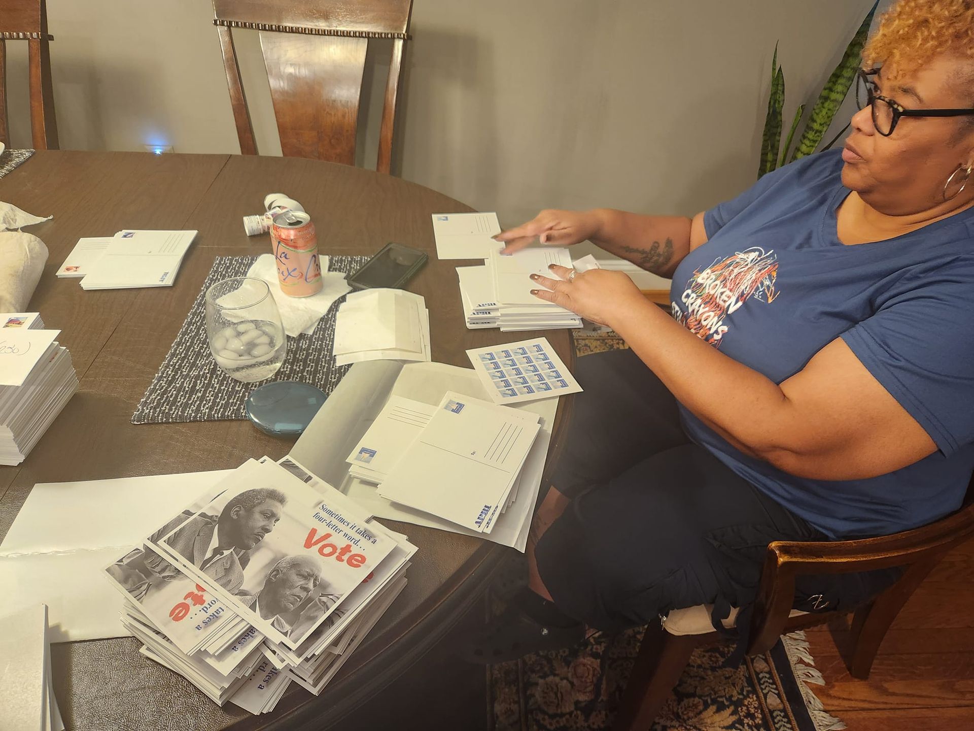 Trish stuffing envelopes