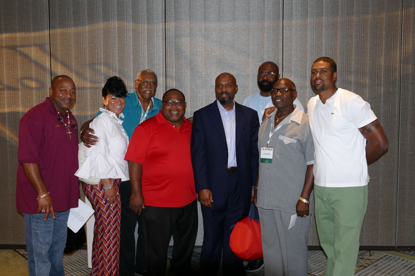 A group of people are posing for a picture together.