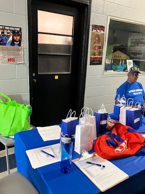voter registration volunteer with swag bags in mississippi
