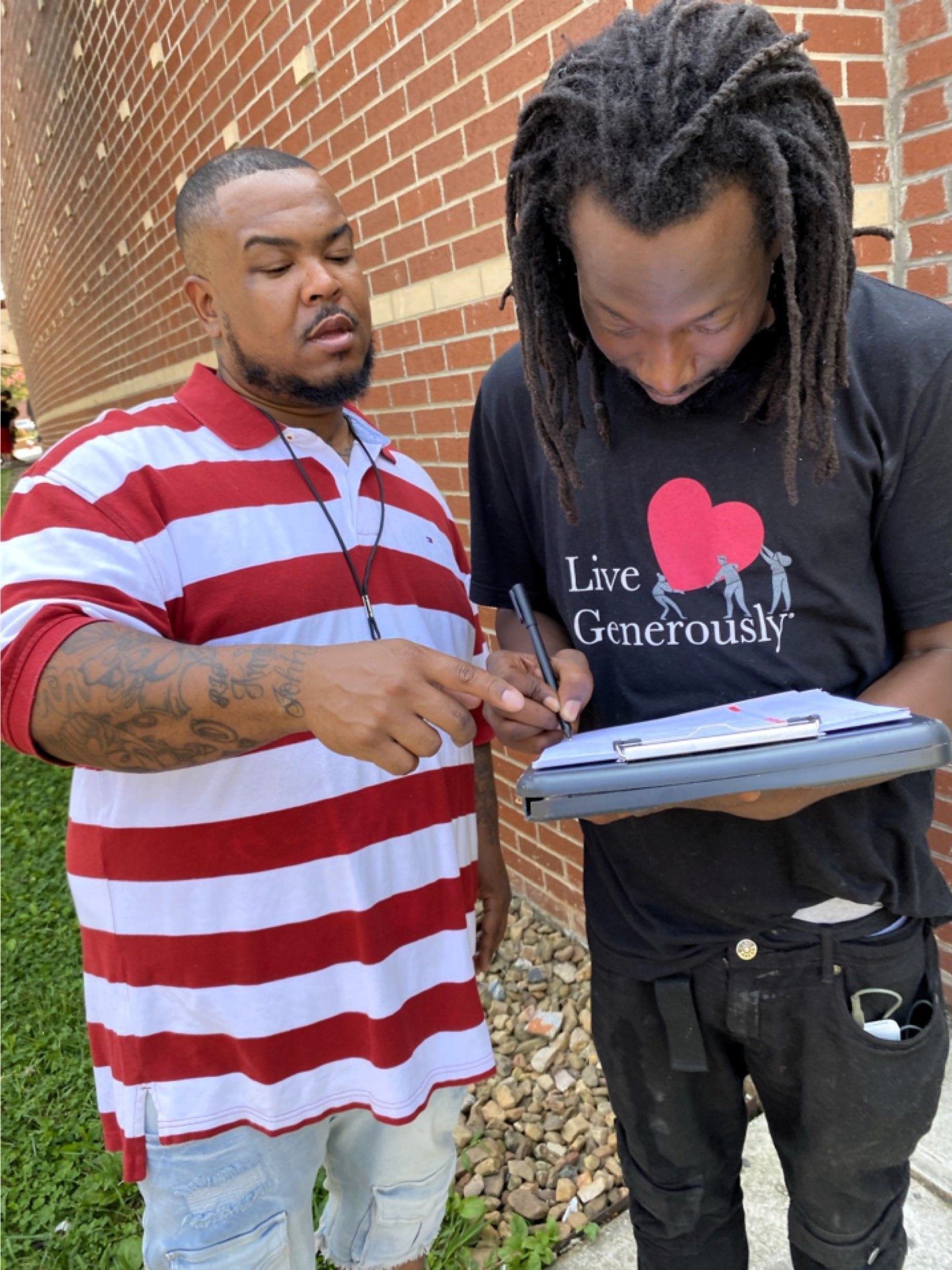 A voter registration volunteer in North Carolina answers a quetion