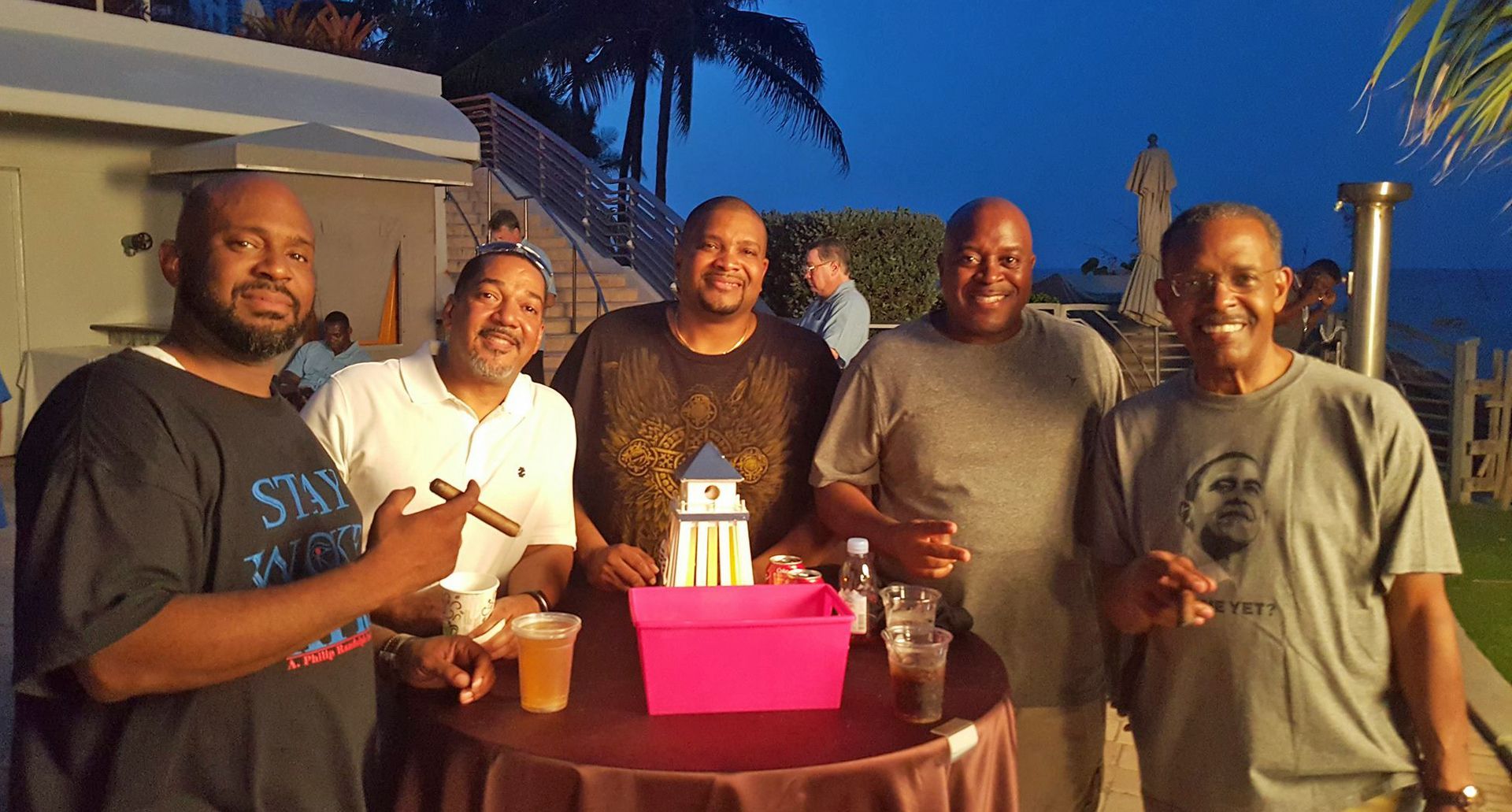 The fellas enjoying a good cigar at the Cigar Bar event