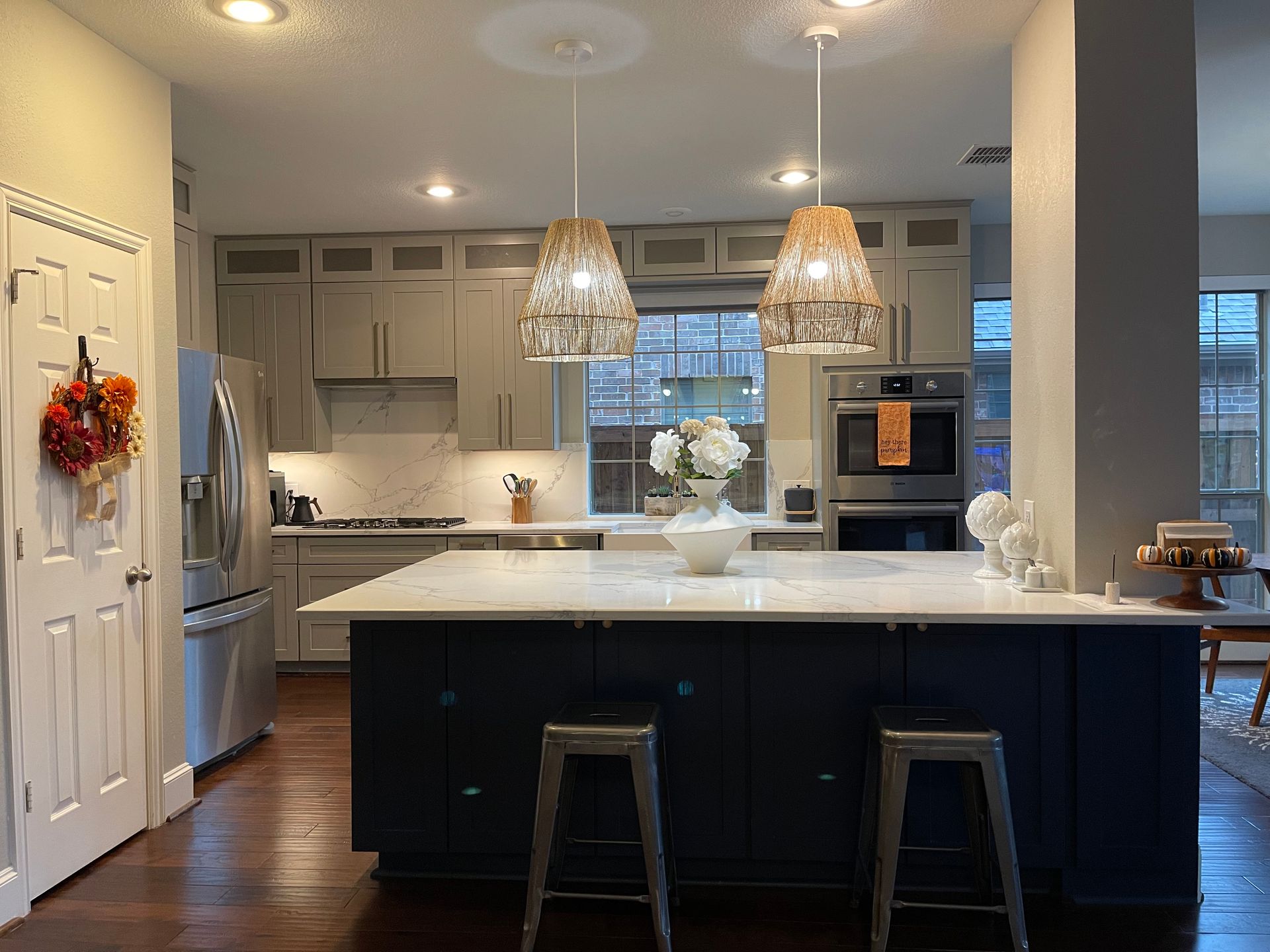 There is a large island in the middle of the kitchen.
