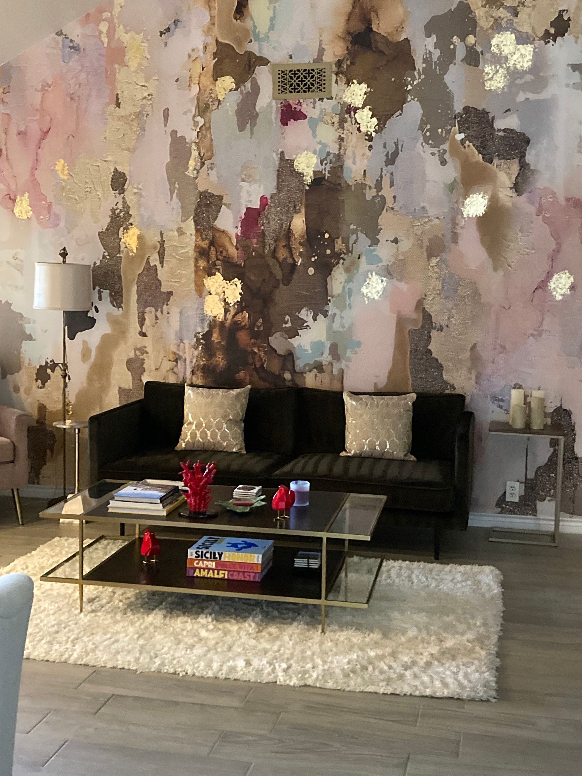 A living room with a couch and a coffee table