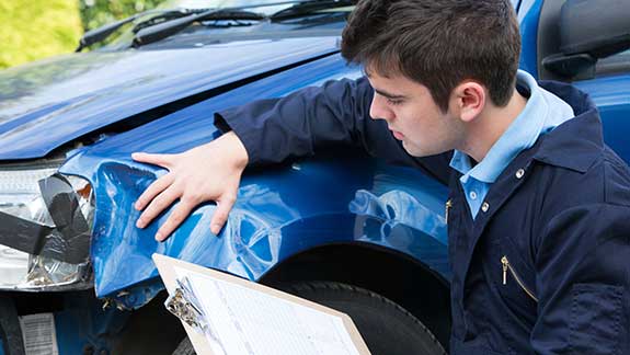 Mechanic Inspecting Car — Austin, TX — Alliance Collision Centers