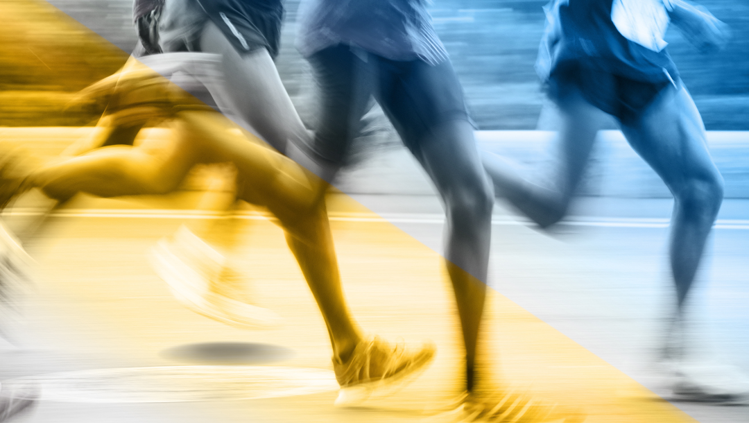 A group of people are standing on a balcony drinking wine.