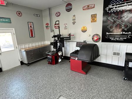 Tire Balancing Machine in the Middle of the Room | Independence Automotive Maintenance & Repair