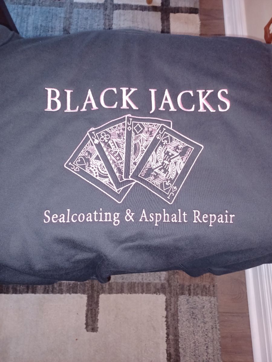 A black jacks sealcoating and asphalt repair shirt