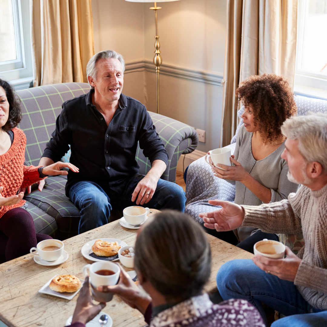 a group of people having coffee