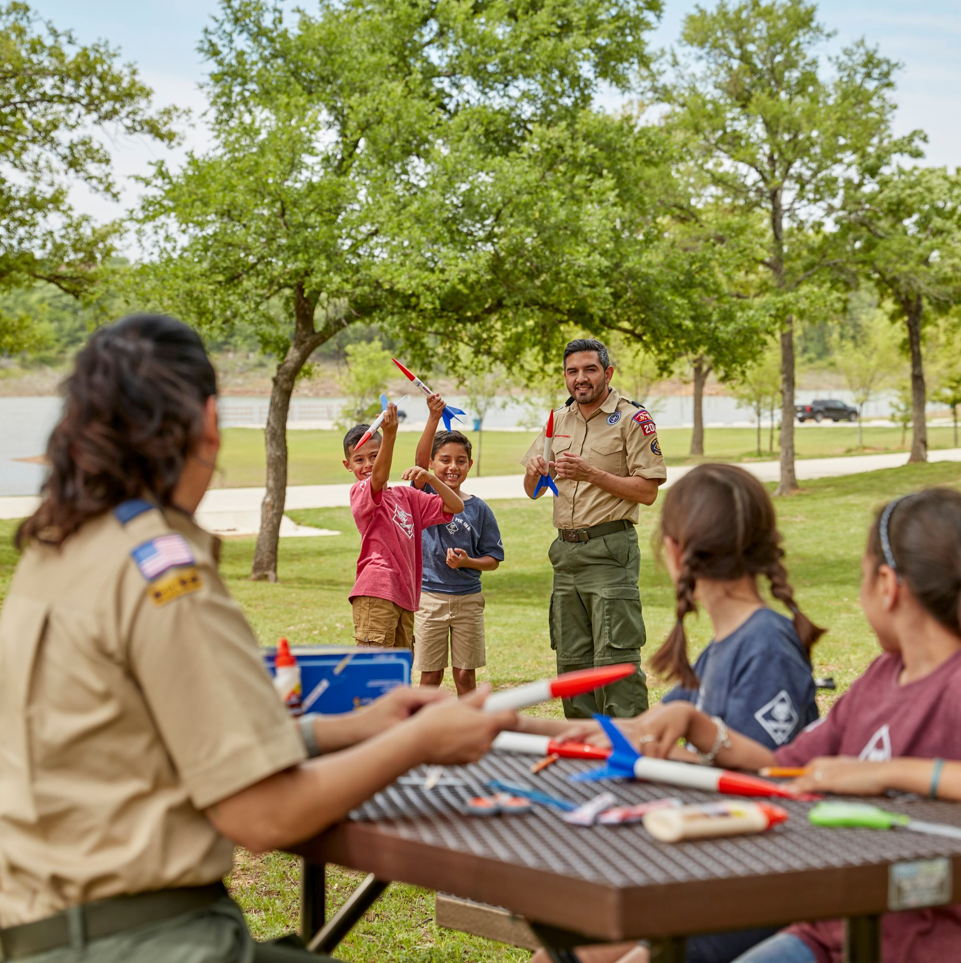 scouts folding an american flag