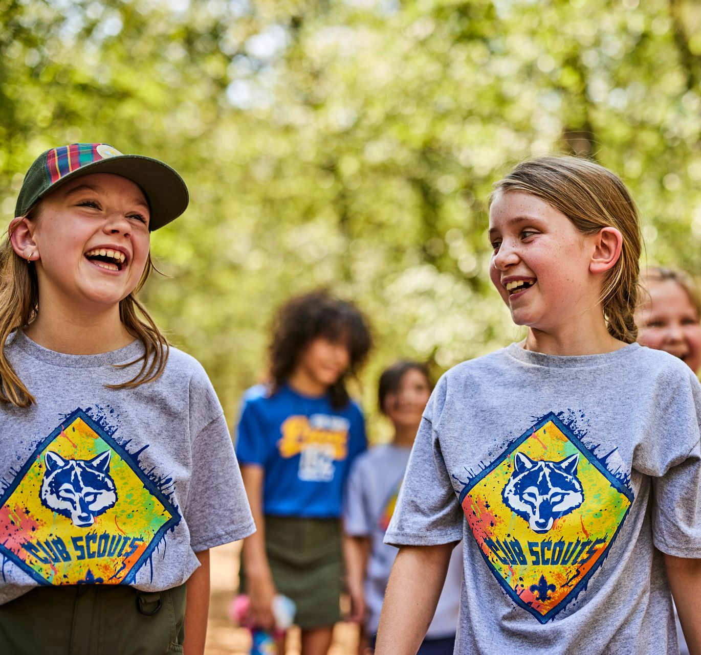 A woman holding a sign that says indians are red