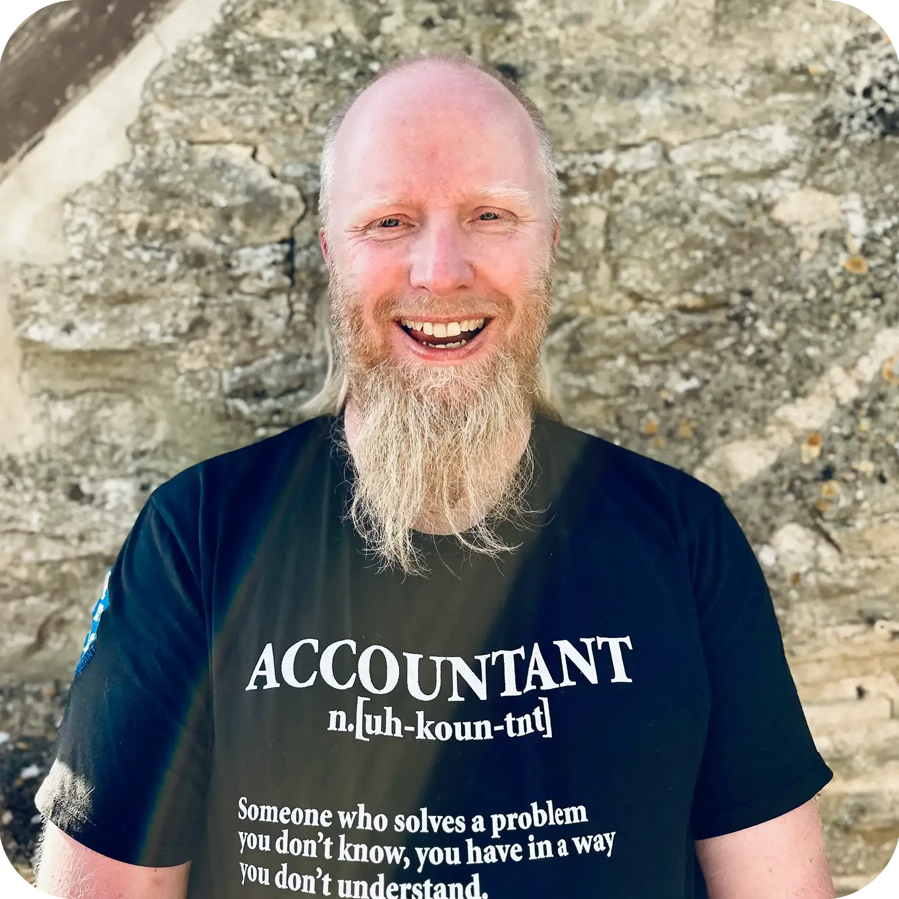 Pat van Aalst wearing a black shirt that says accountant