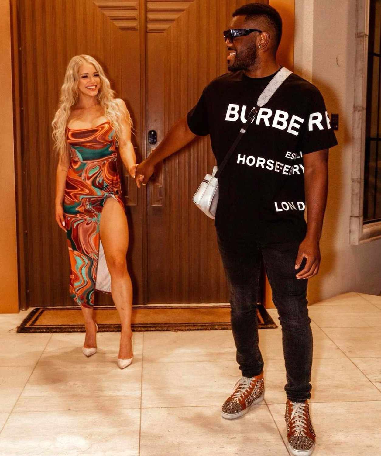 Courtney Clenney and Christian Obumseli in condo