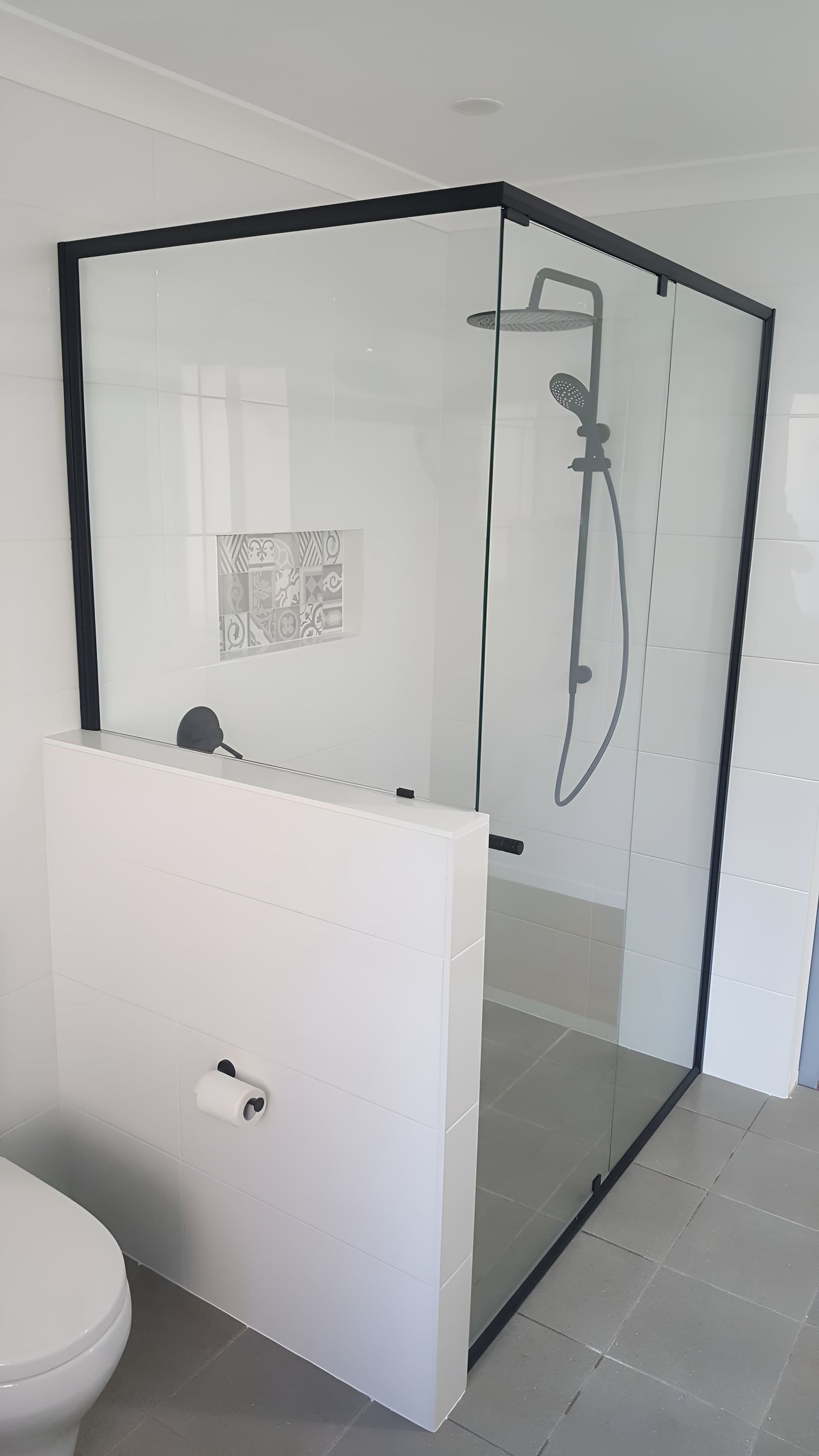 A Bathroom With A Shower Stall And A Toilet — All Hours Glass In Culburra Beach, NSW