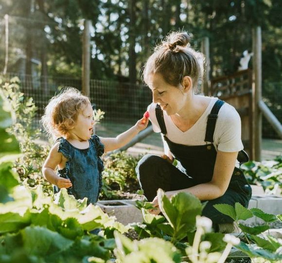 Mother with her child in the garden