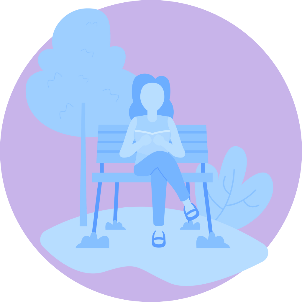 A woman is sitting on a park bench reading a book.