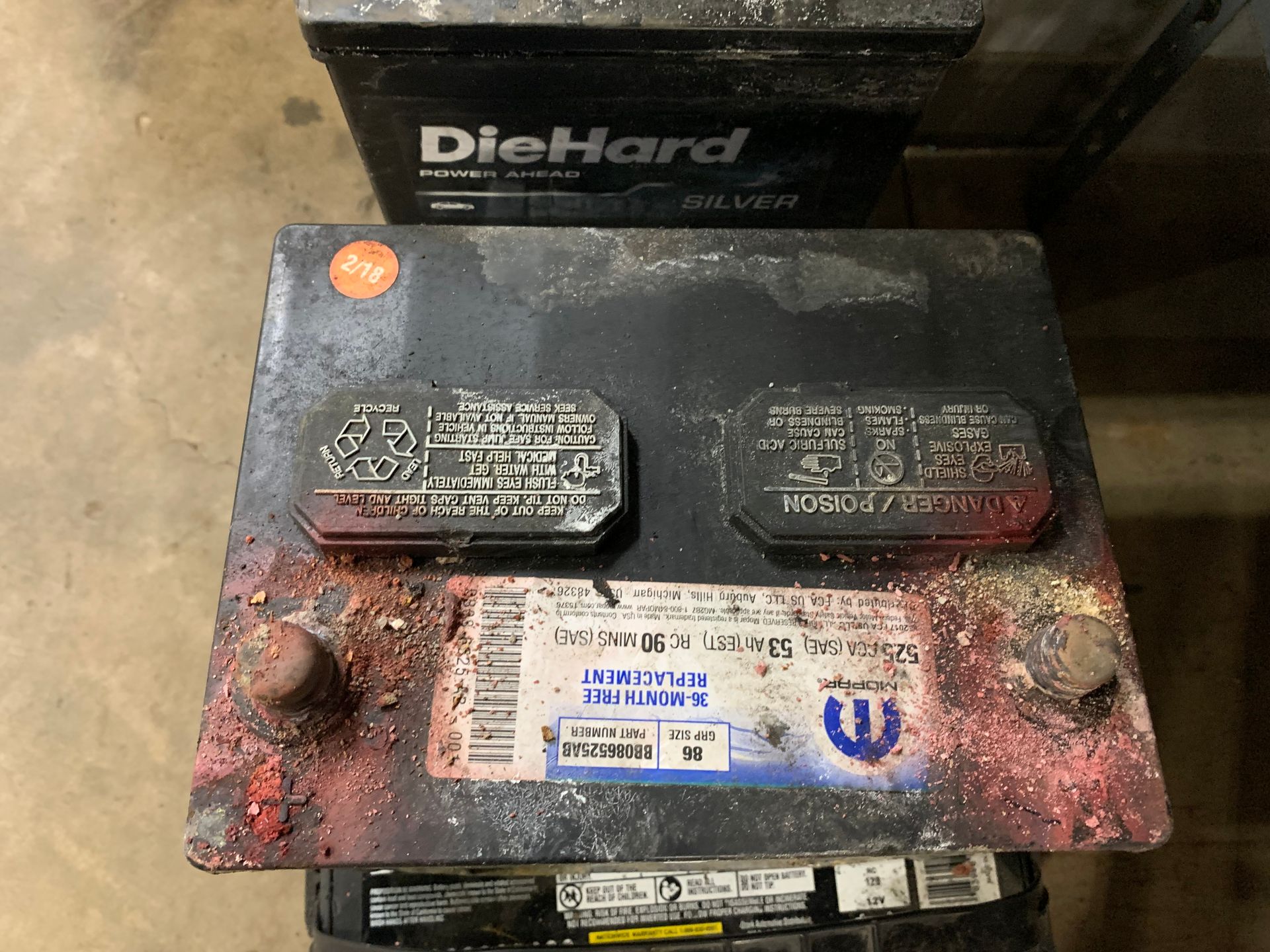 Two diehard batteries are stacked on top of each other | Lou's Car Care Center, Inc.