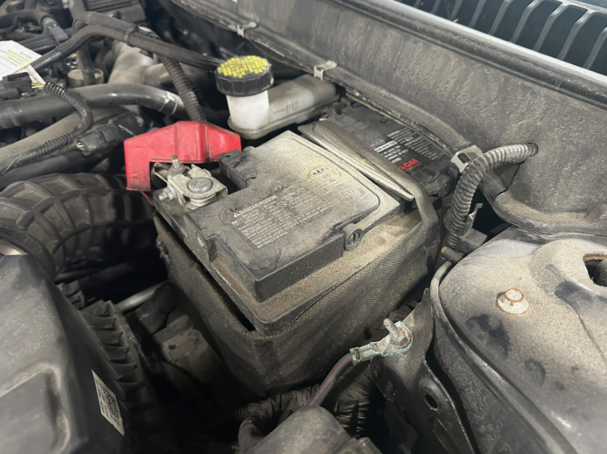 Drained vehicle battery in a car | Lou's Car Care Center, Inc.