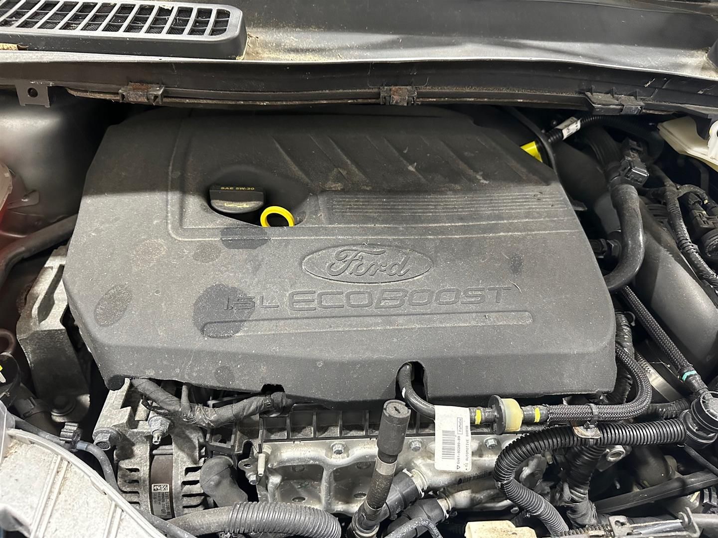 A close up of the engine of a ford ecoboost car.  | Lou's Car Care Center, Inc.