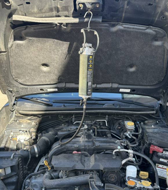 Fuel Induction Service on a Subaru. Lou's Car Care Center, Inc.
