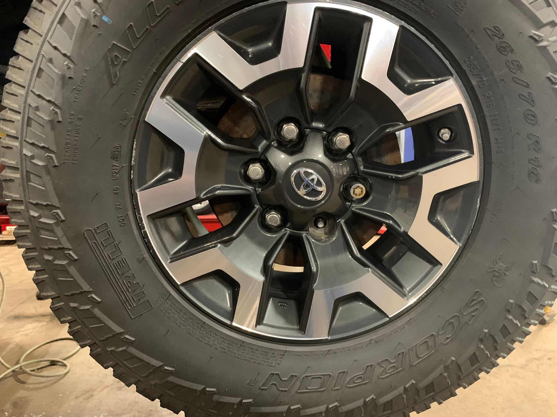 A close up of a tire on a toyota truck | Lou's Car Care Center Inc.