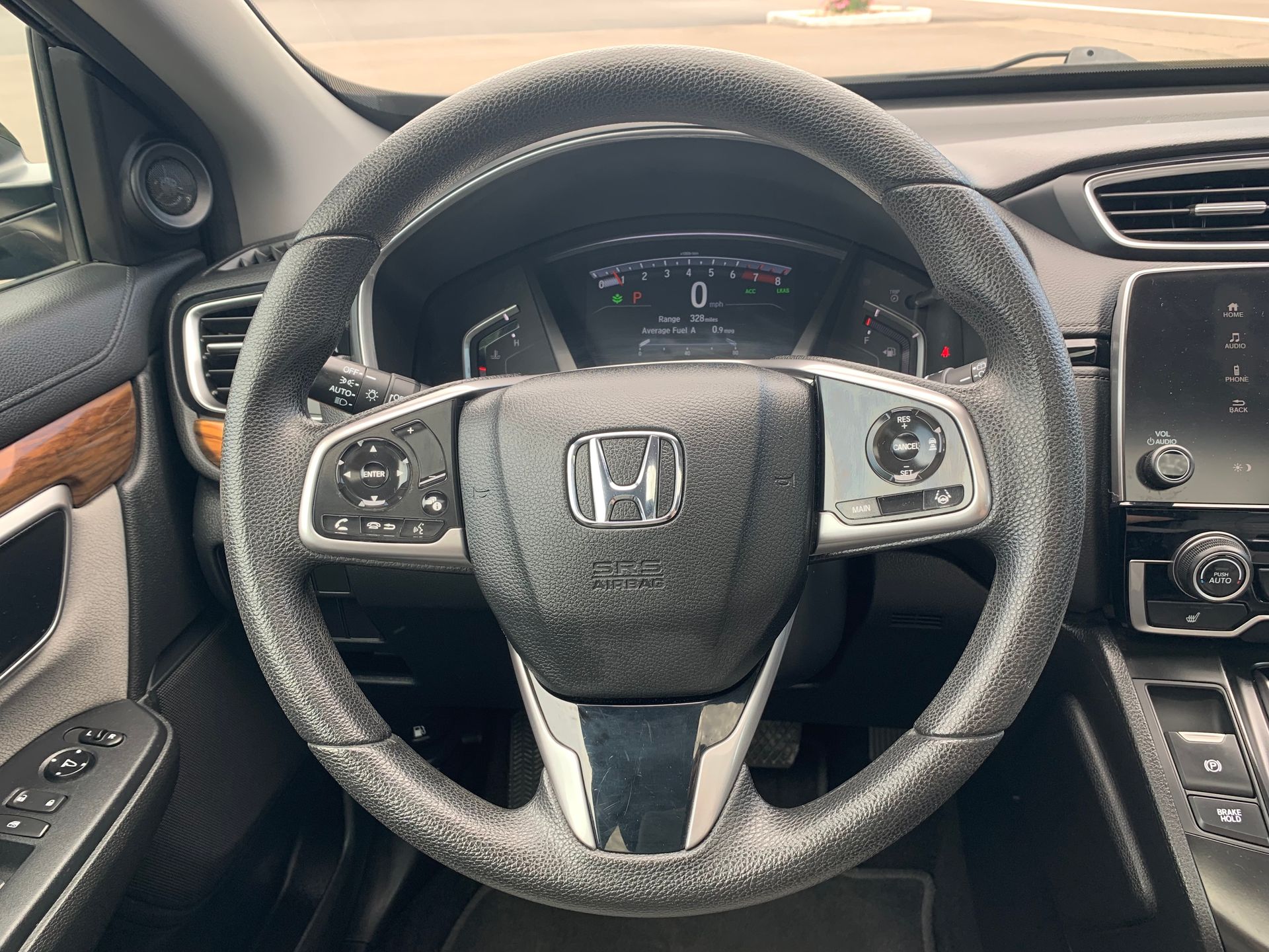 A close up of the steering wheel of a honda cr v. | Lou's Car Care Center Inc.