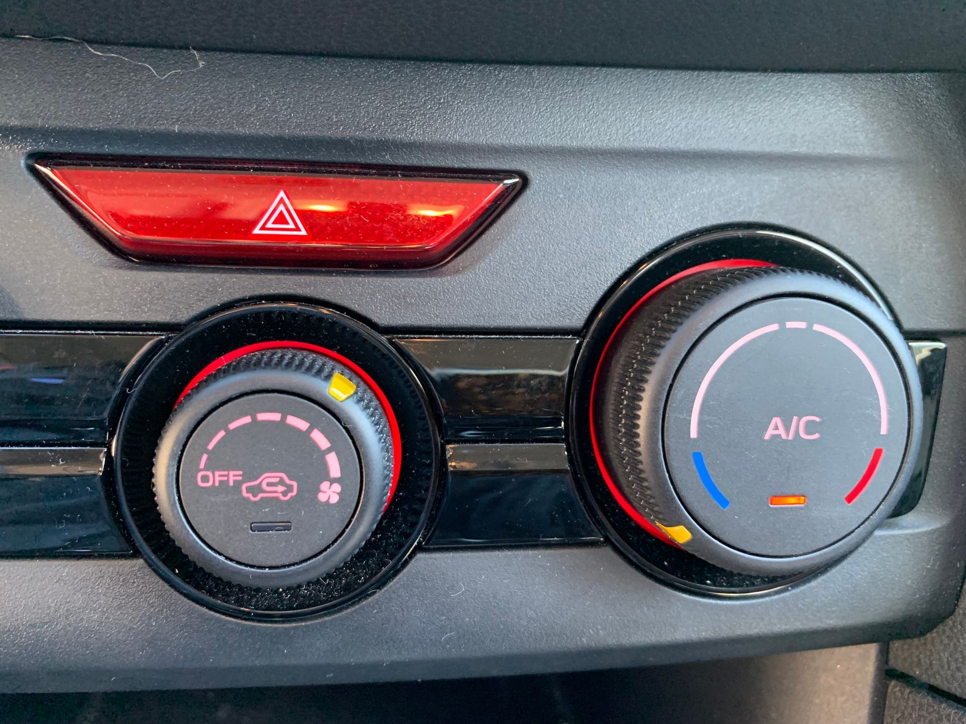 A close up of the a/c controls on a car | Lou's Car Care  Center Inc.