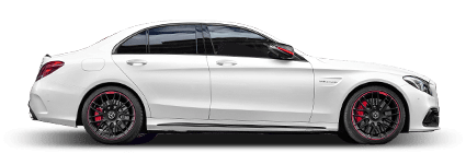 A white mercedes benz c class with red wheels on a white background. | Lou's Car Care Center