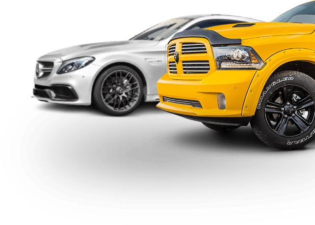 A silver car and a yellow truck are parked next to each other on a white background. | Lou's Car Care Center