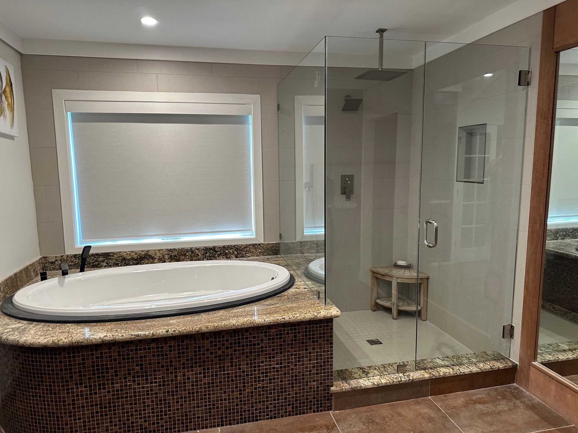 Bathroom with a white oval tub