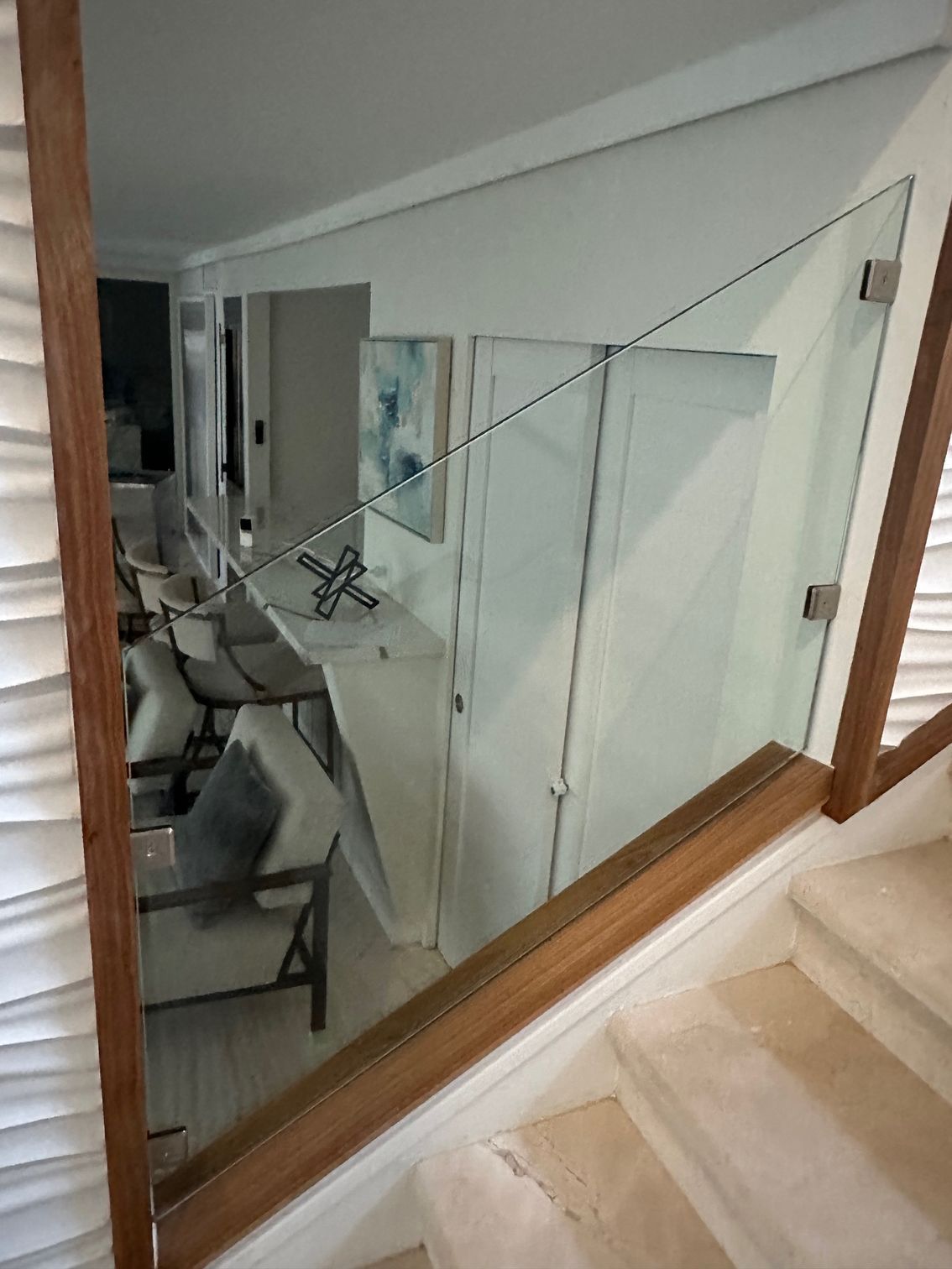 Staircase with glass and wood railing