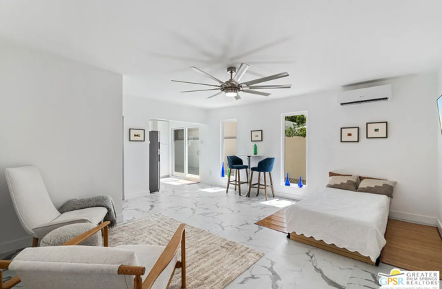 Bright studio apartment with white walls