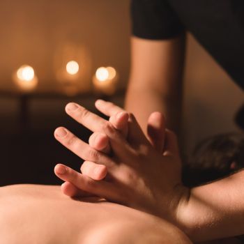 A person is receiving a therapeutic massage