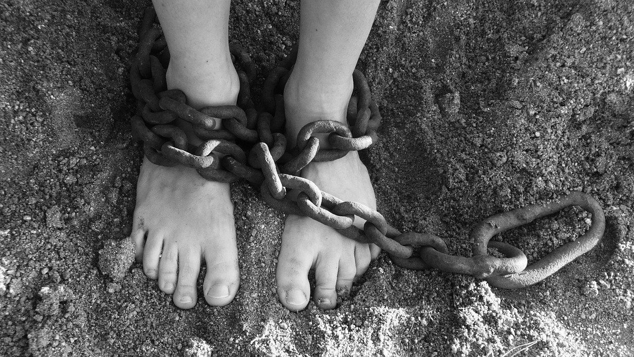 feet in shackles because people are punished when they don't lie to protect a leader