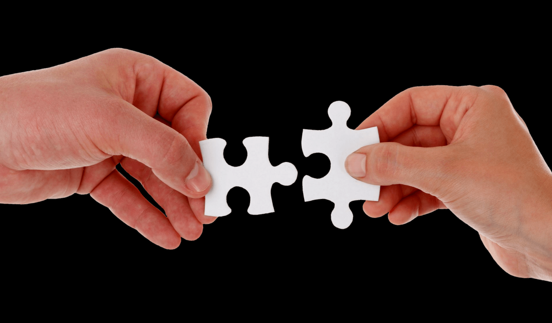 two hands holding 2 puzzle pieces for best way to treat OCD