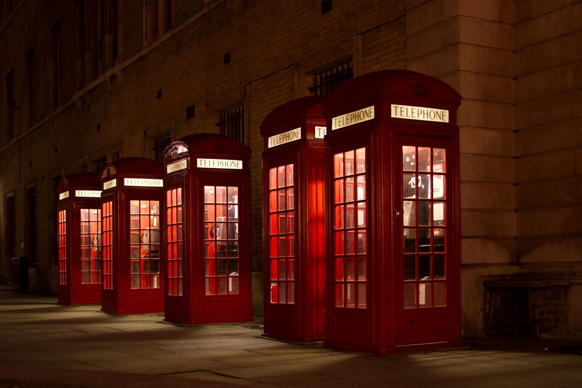 Red English style phone booths for when to call an OCD specialist