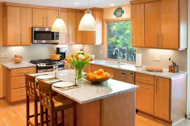 Kitchen remodeling project with light-colored wood kitchen cabinets