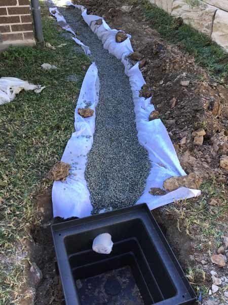 tarp with rocks