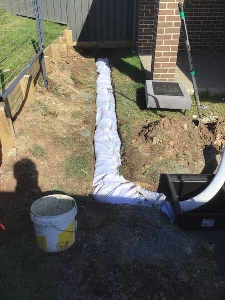 plumbing in the ground being filed