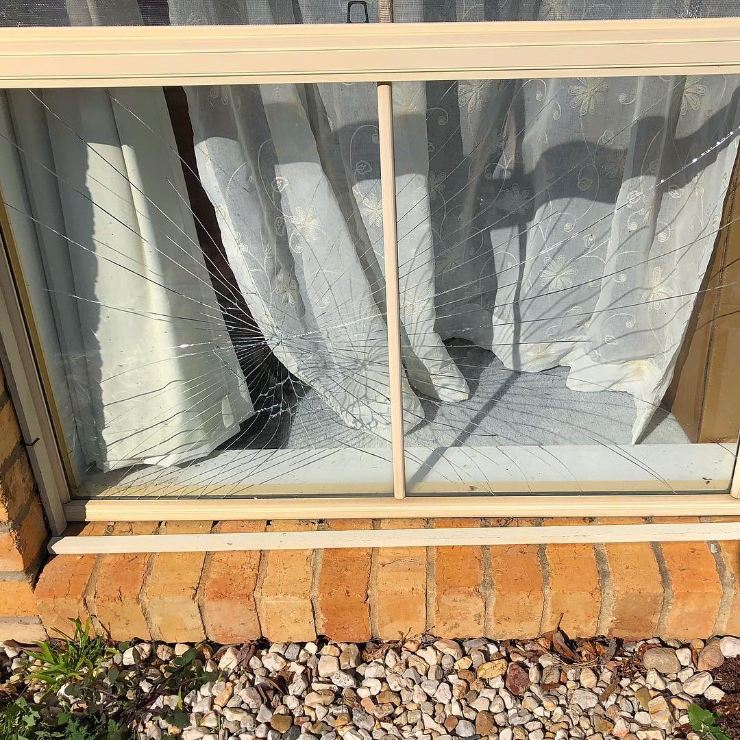 Repairing a broken window with new glass, showcasing Aussie Emergency Glass’s expertise in glass repair and replacement.