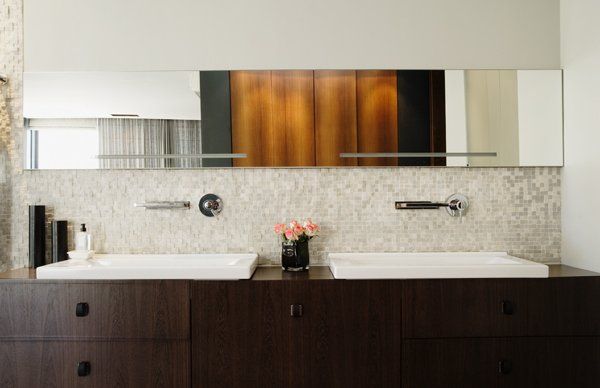 long glass mirror in bathroom