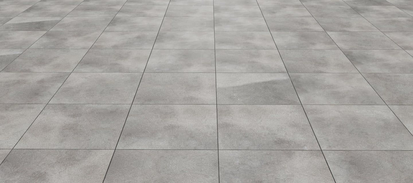 Gray tiled pavement receding into the distance.