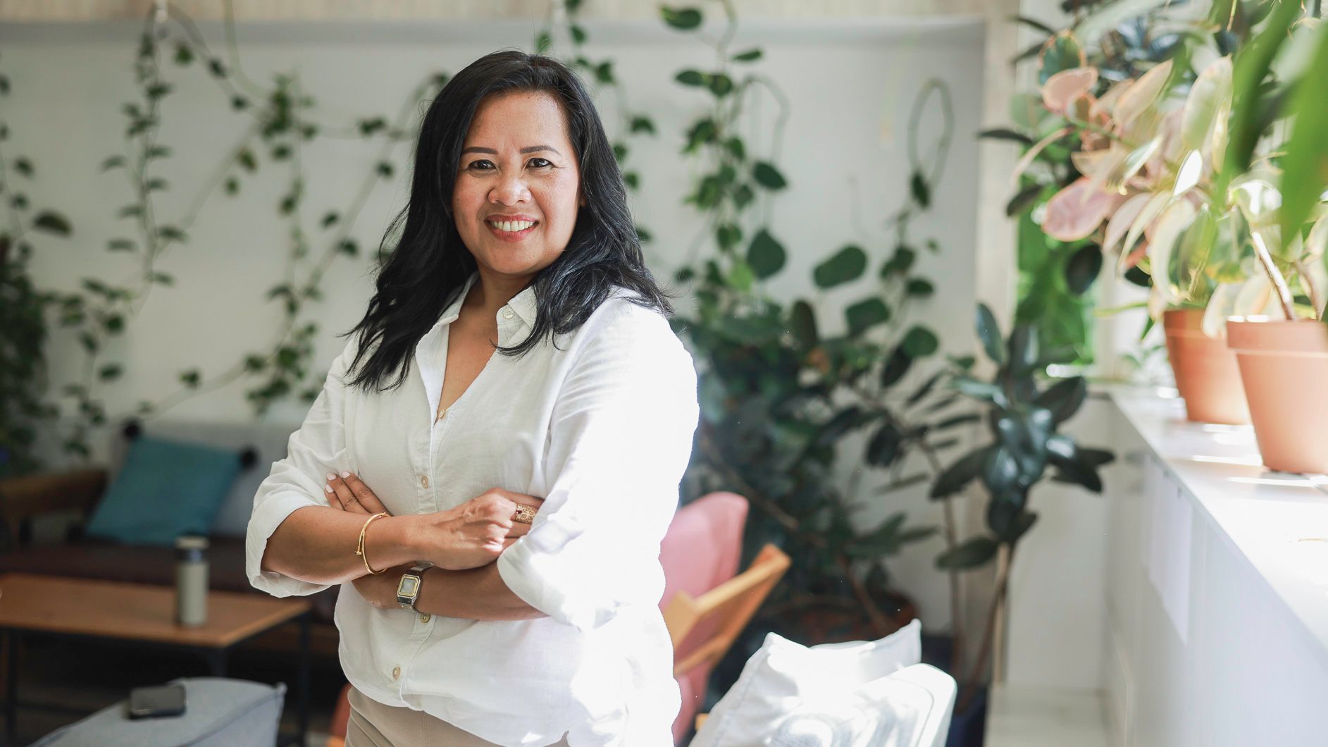 woman standing in her small business