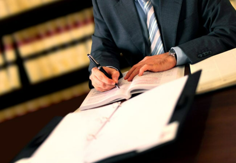 Attorney With Paperwork — Jamestown, NY – Bly, Sheffield, Bargar & Pillittieri