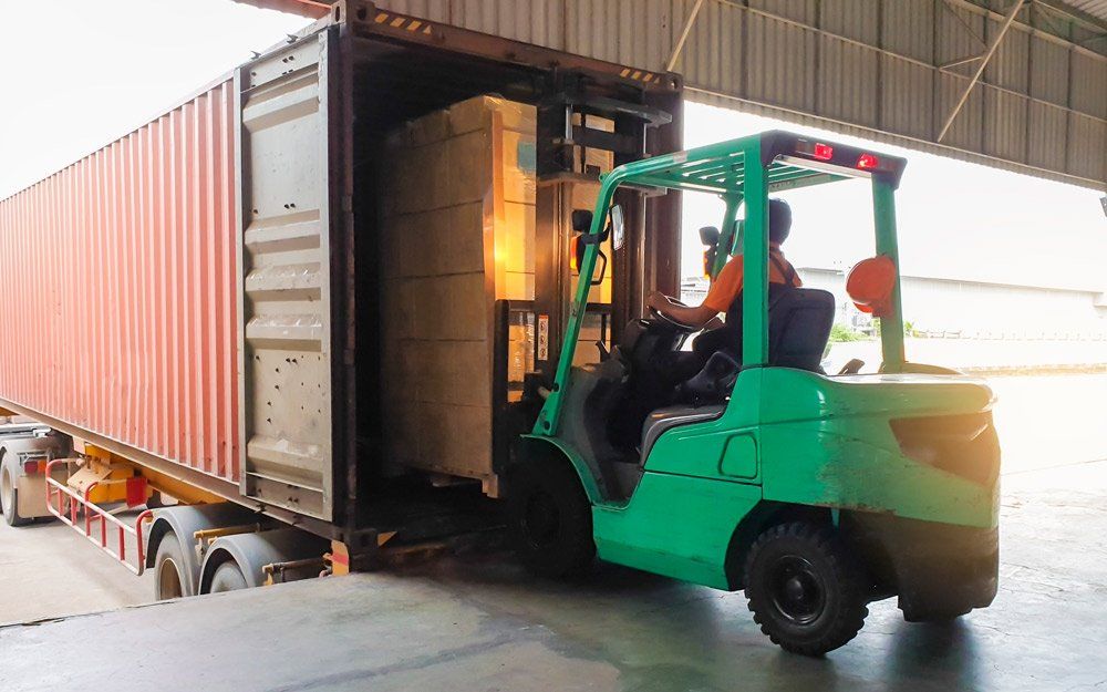 Warehouse Machine Lifting Boxes — Arlington, TX — Pronto Courier Delivery and Logistics