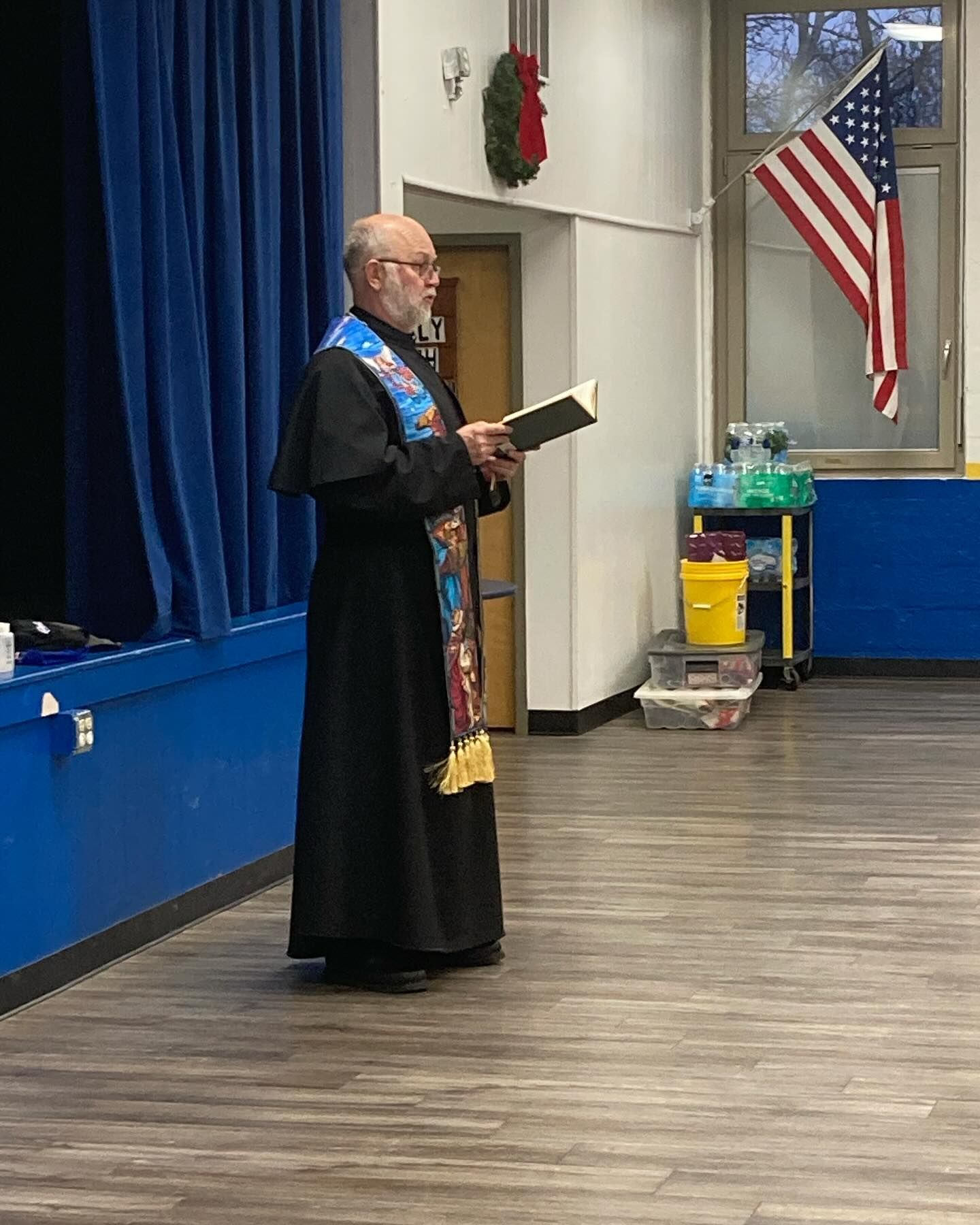priest saying prayer