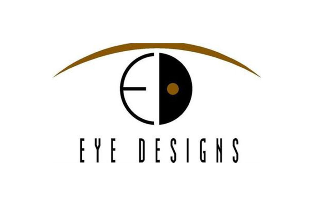 a logo for eye designs shows an eye with a circle in the middle .