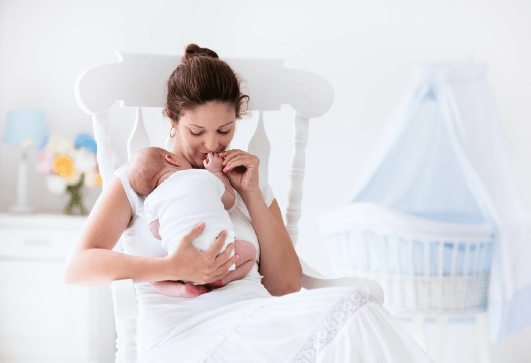 Woman Holding Baby — Yorktown, VA — Anchor Pools & Spas