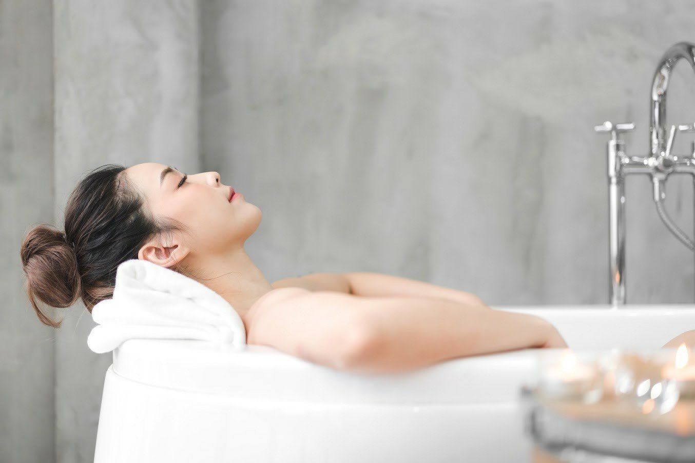 Woman Relaxing on Hot Tub — Yorktown, VA — Anchor Pools & Spas