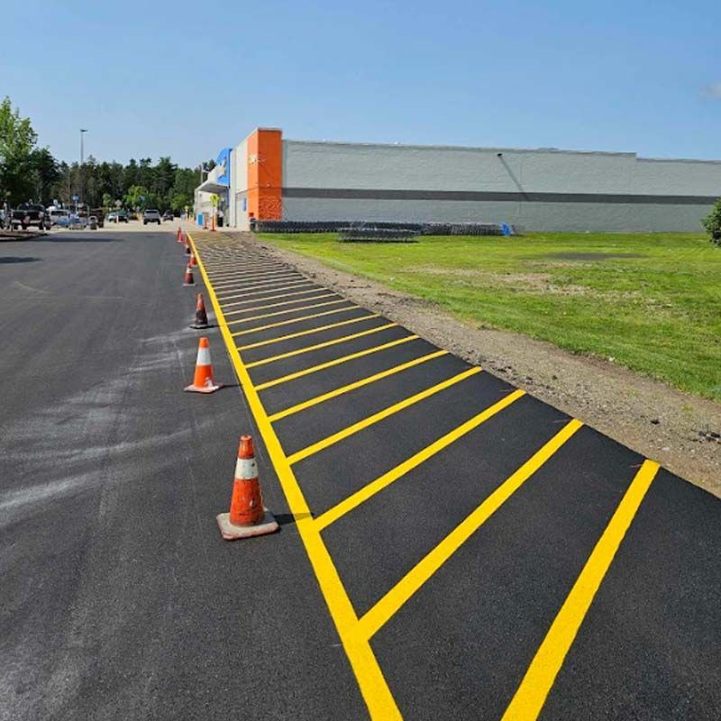 a parking lot with yellow lines